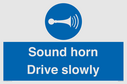 sound-horn-drive-slowly-warehousing-and-delivery-sign~